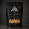 pawverest-crunch-package-front-1200 Front view of the black Pawverest Crunch premium dog treat pouch with puffed treats visible through the package window.